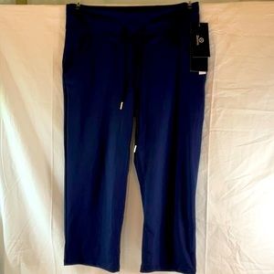 Zeronic athletic capris large. Navy - two front pockets. Polyester and spandex